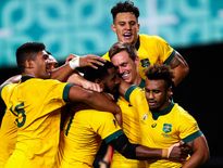 Les Australiens célèbrent la victoire contre les Fidji