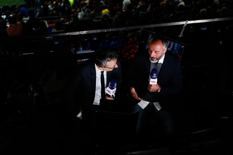 Jérôme Sillon et Eric Di Meco au micro de RMC pour commenter Paris Saint-Germain face au Real Madrid au Parc des Princes en septembre 2019.